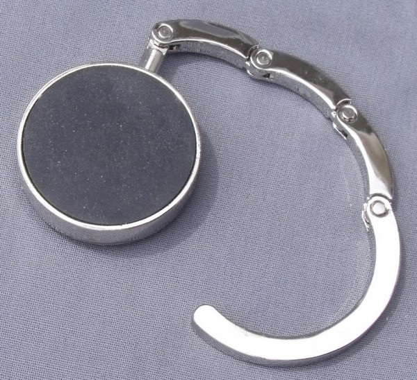 The back of the purse hook showing the rubber pad.