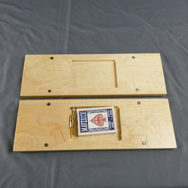 Open, maple 2 Player Cribbage Board showing the storage inside the board for the pegs and cards.