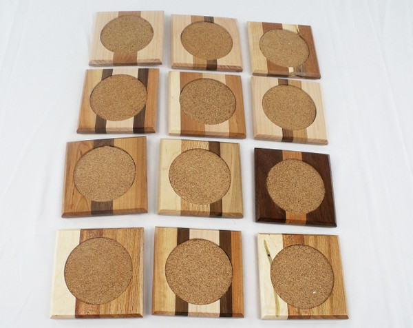 A sampling of multiple  coasters set out side-by-side.  No two coasters are the same.  This is an example of the coasters.  The actual product you receive will differ.