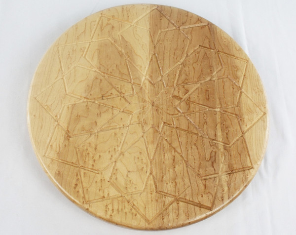Top view of the birdseye maple lazy susan with the square rose design.