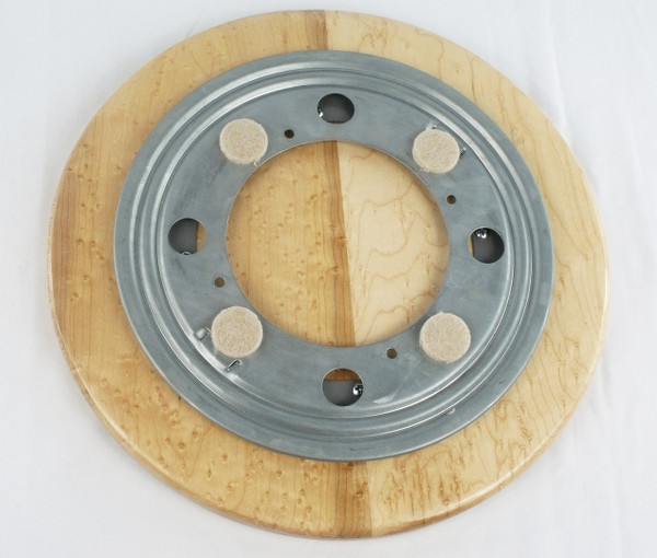 Bottom of the lazy susan showing the bearing with the felt pads.