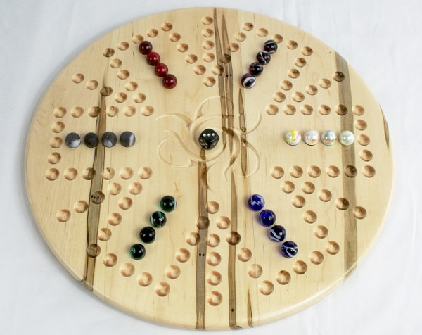 6 player side of the Aggravation 4 Player / 6 Player Combination board in Ambrosia Maple with the marbles and die.