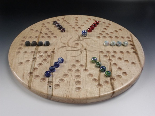 6 player side of the Aggravation 4 Player / 6 Player Combination board in Ambrosia Maple with the marbles and die.