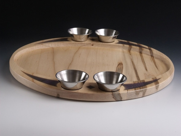 Side view of the ambrosia maple serving tray with purple resin and stainless steel cups.