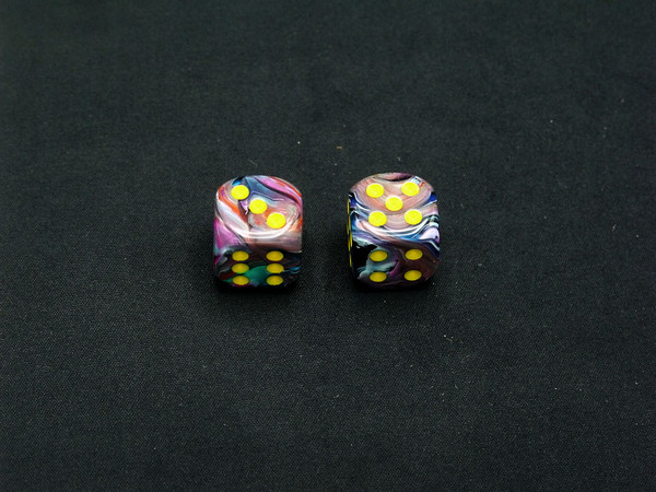 One pair of 16mm Festive Mosaic d6 dice with yellow pips.