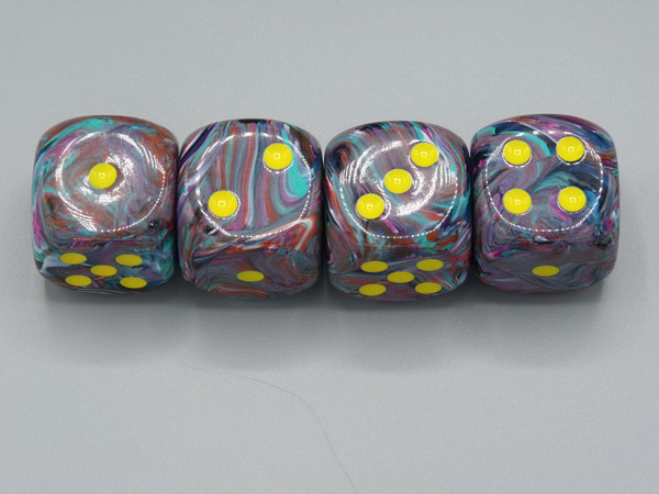 Four dice showing the variety between them.