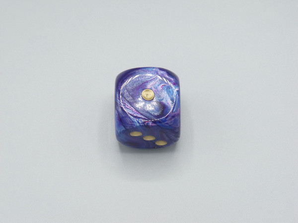 One 30mm Lustrous Purple die with gold pips.