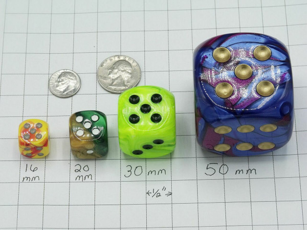 Four dice with a dime and a quarter for size comparisons.  The dice are 16mm, 20mm, 30mm, and 50 mm.