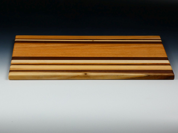 Top view of the multi-wood serving board #28 showing the thickness of the board.