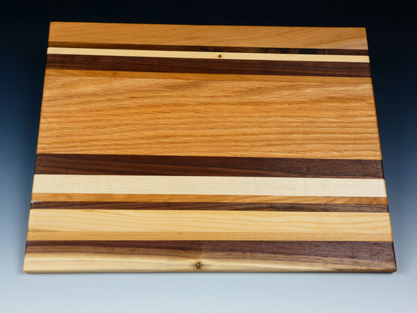 Top view of the multi-wood serving board #28 showing the different woods that comprise the board.