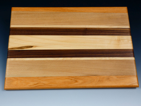 Back view of the multi-wood serving board showing the different woods.
