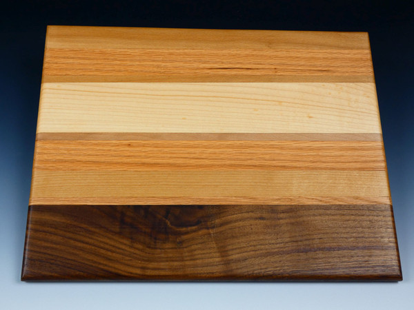 A serving or cutting board made up of several different woods.