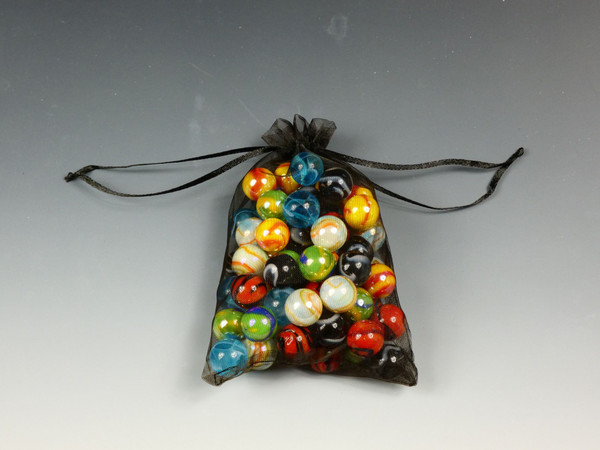 Replacement Chinese Checkers Marbles in the storage bag.