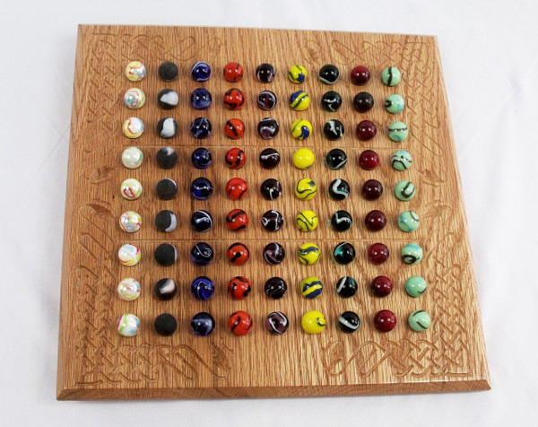 A deluxe Sudoku board with 81 marbles.
