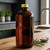 Screw Cap 28/410, Antique Gold Metal with PE Liner with Dark Amber Bottle in Kitchen