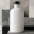 Apothecary Reed Diffuser Bottle Set, Black Cork, 8 oz Glossy White with Silicone Non-Slip Boot on Rocks
