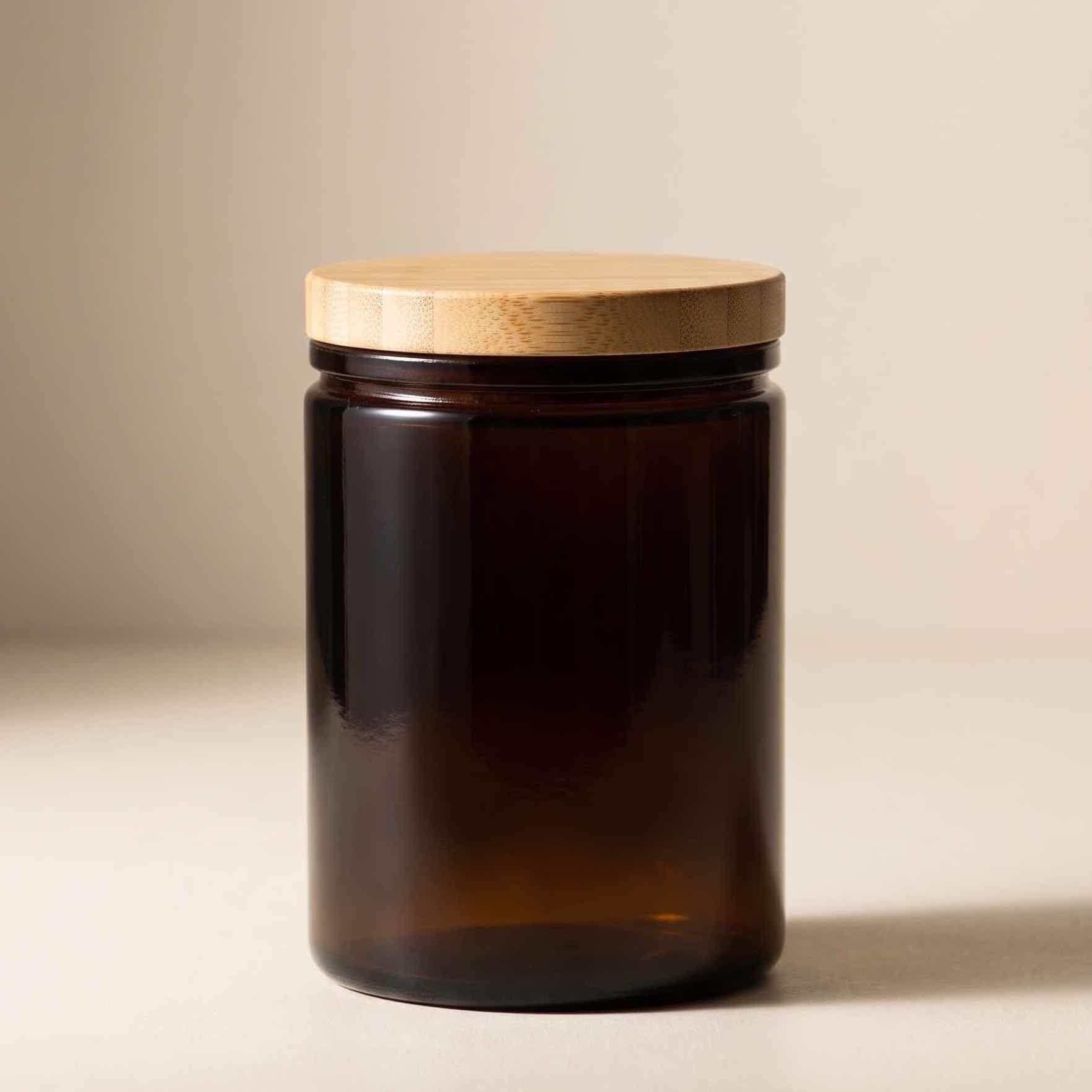Neo 10 Natural Bamboo Lid 80mm on 12 oz Calypso Jar in Dark Amber (6184G48) — full product view showing warm bamboo finish and elevated packaging presentation