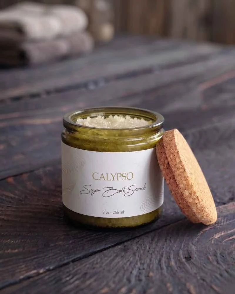 9 oz Cork Finish Calypso Glass Jar in vintage green filled with bath scrub