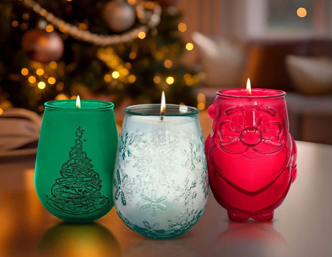 100% recycled Flurry glass holiday candle container with snowflake embossing