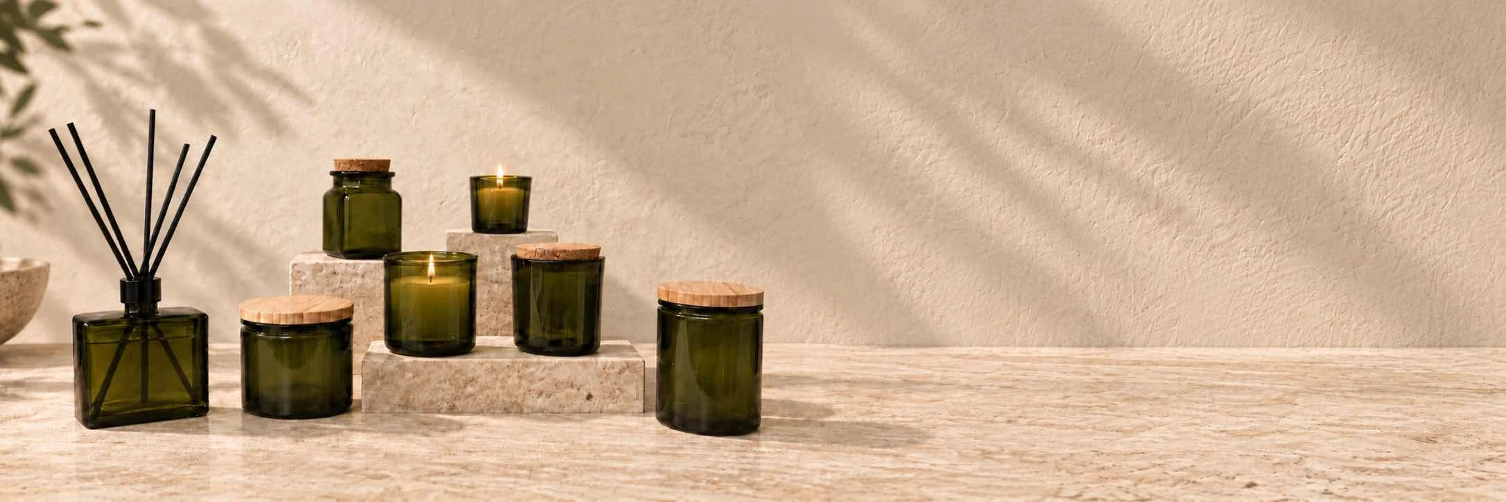 Assortment of Glassnow glass candle containers and vessels