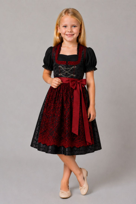 Kids Dirndl Liesel — black Kinderdirndl with red lace apron in German sizes 80–164. Authentic festive Bavarian Trachten for children's special occasions.