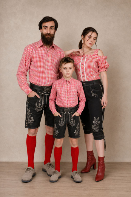 Ludwig Family Matching Lederhosen Set featuring black leather Bavarian outfits with beige embroidered details for men, women, and boys, paired with red gingham shirts for Oktoberfest.