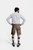 Rear view of full-body shot of the man wearing the traditional german lederhosen.