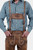 Close-up of a man wearing a light blue checkered shirt and Acropolis authentic Bundhosen, focusing on the chest embroidery and waistband of the Bundhosen.