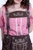Detailed view of the Liesel Pritzker Lederhosen with traditional embroidery and suspenders.
