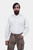 closed front view of a man wearing stamberg cargo long lederhosen paired with plain white shirt