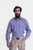 A man wearing the Bach Lederhosen Shirt, a blue and white checkered long-sleeve shirt with a front pocket. He pairs it with light brown leather Lederhosen adorned with blue embroidery and a decorative belt buckle. This traditional Bavarian outfit is perfe