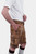 A man with a beard is standing in a three-quarter view against a white background, wearing a short-sleeved white shirt and brown leather lederhosen. He has his right hand in the pocket of the lederhosen, and is also wearing brown and grey knee-high socks 