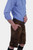 Closed Side view of a man in a blue striped shirt is posing in traditional brown leather cargo Lederhosen. The outfit is accessorized with a belt and traditional Bavarian socks and shoes. The side view showcases the side pockets and the decorative belt bu