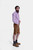 Complete side view of a man in Brecht Classic Lederhosen, Burnished Bronze with intricate embroidery and stylish buttons.