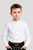 Boy wearing Elias kids white cotton shirt paired with traditional black lederhosen shorts in studio portrait