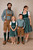 Franz family matching Oktoberfest outfit featuring premium goat suede leather embroidered lederhosen for men and boys, paired with elegant green dirndl dresses for women and girls, perfect for Oktoberfest, Bavarian festivals, and traditional German celebr