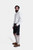 Authentic Oktoberfest clothing, a man models black lederhosen with a luxurious texture and rich embroidery.