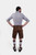 Rear view of a man wearing Ein Prosit Lederhosen, showing the back design of the brown leather shorts and the fit around the waist.