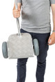 Man holding the Standing Trailer with one hand.