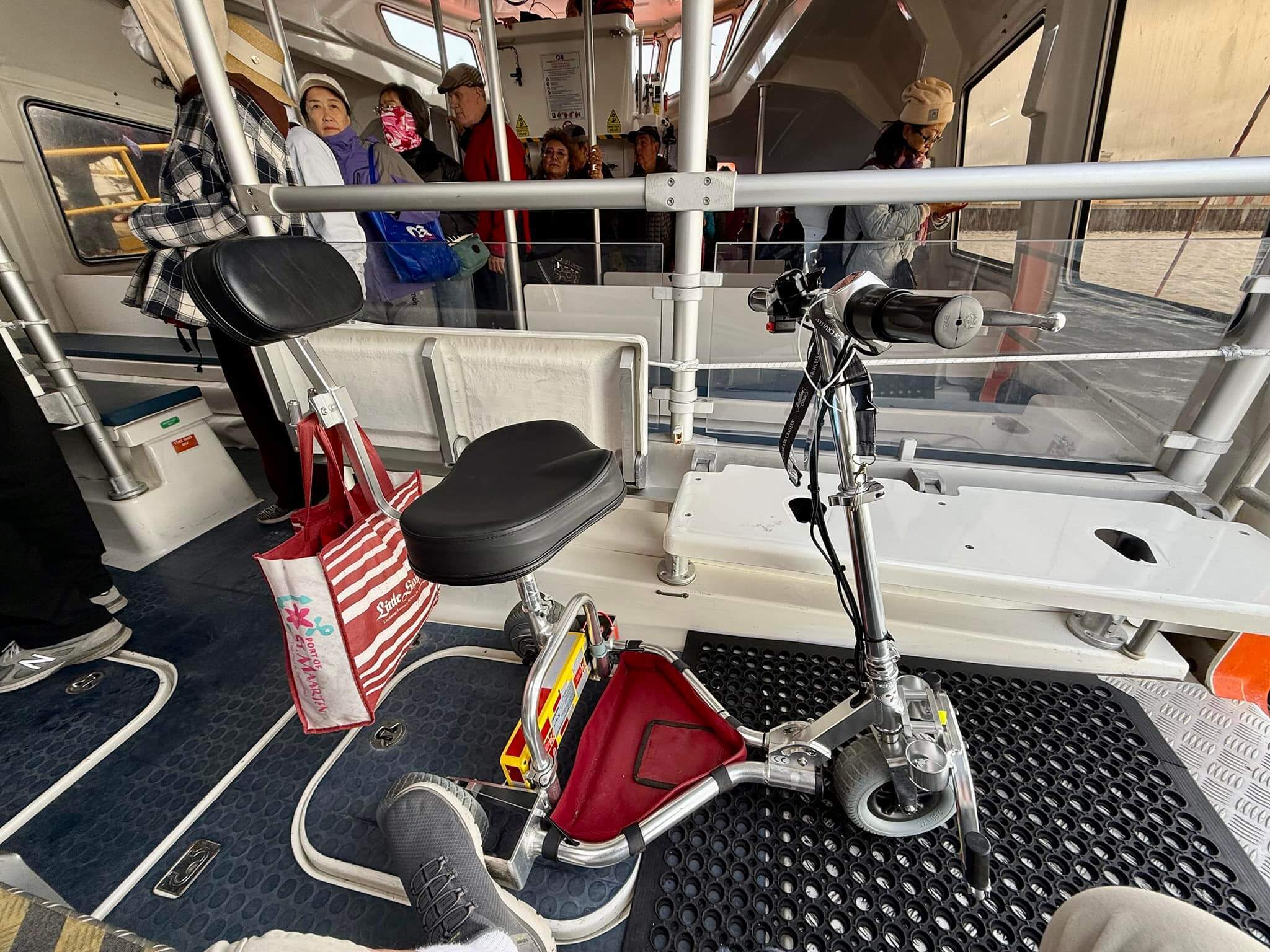 TravelScoot mobility scooter on a tender.