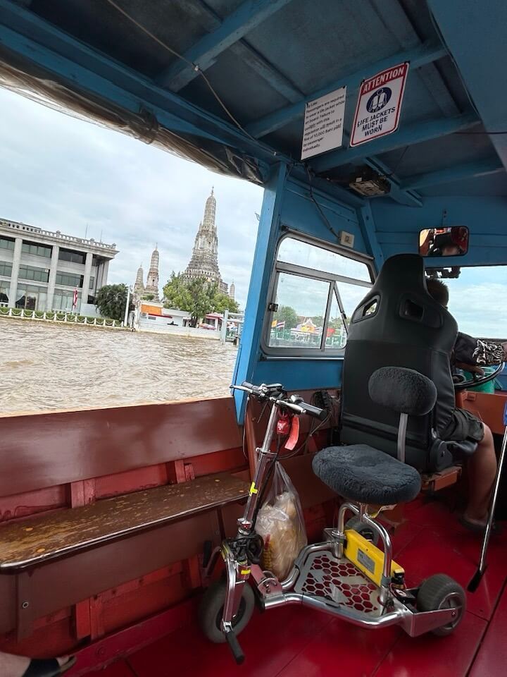 Mobility scooter river cruise in Bangkok.