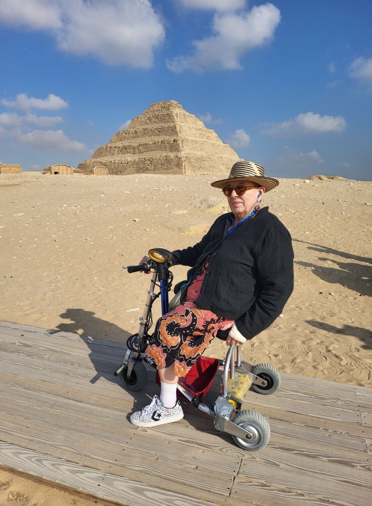 Woman riding scooter in Egypt