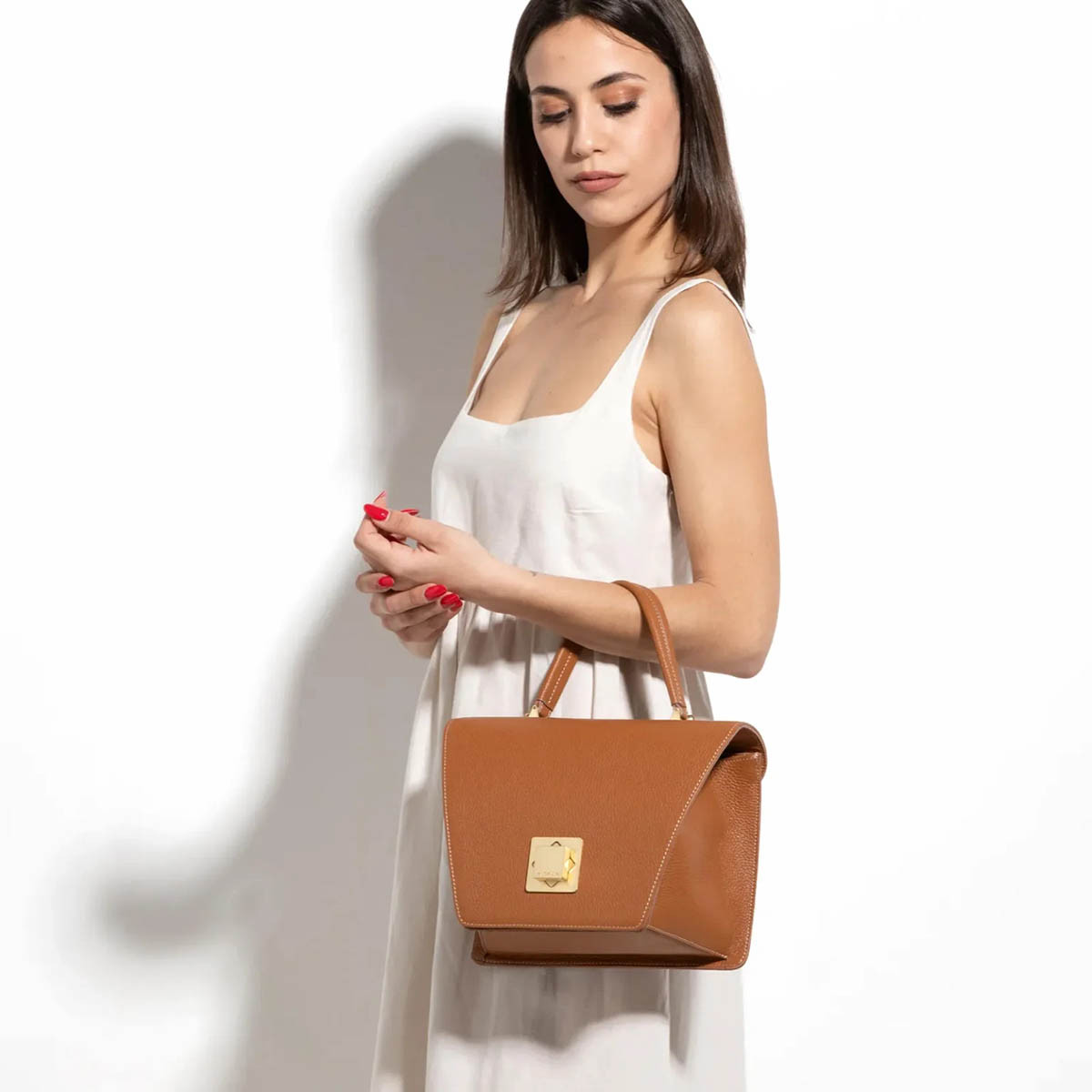 Arcadia Trapeze Pebble Leather Grab Handbag