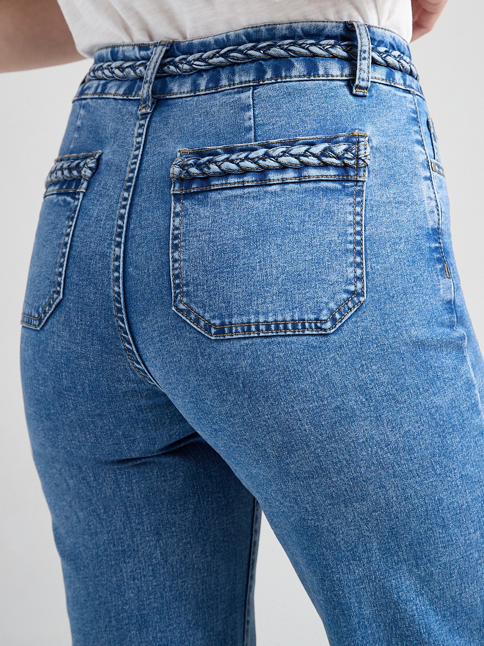 High Rise Braided Waistband Wide Leg Jean in Mid Wash | Ricki's