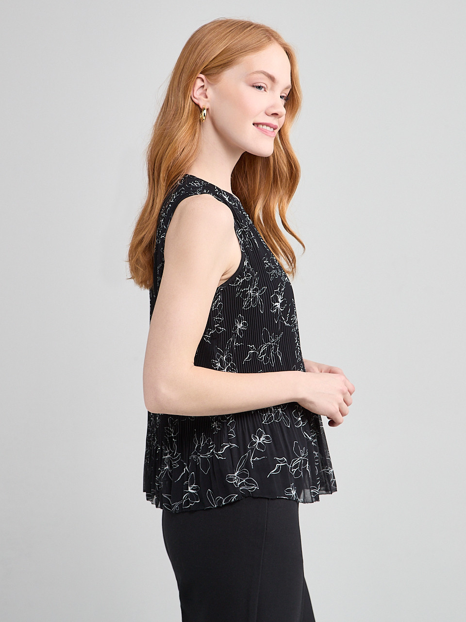 Sleeveless Pleated Top in Line Floral | Ricki's