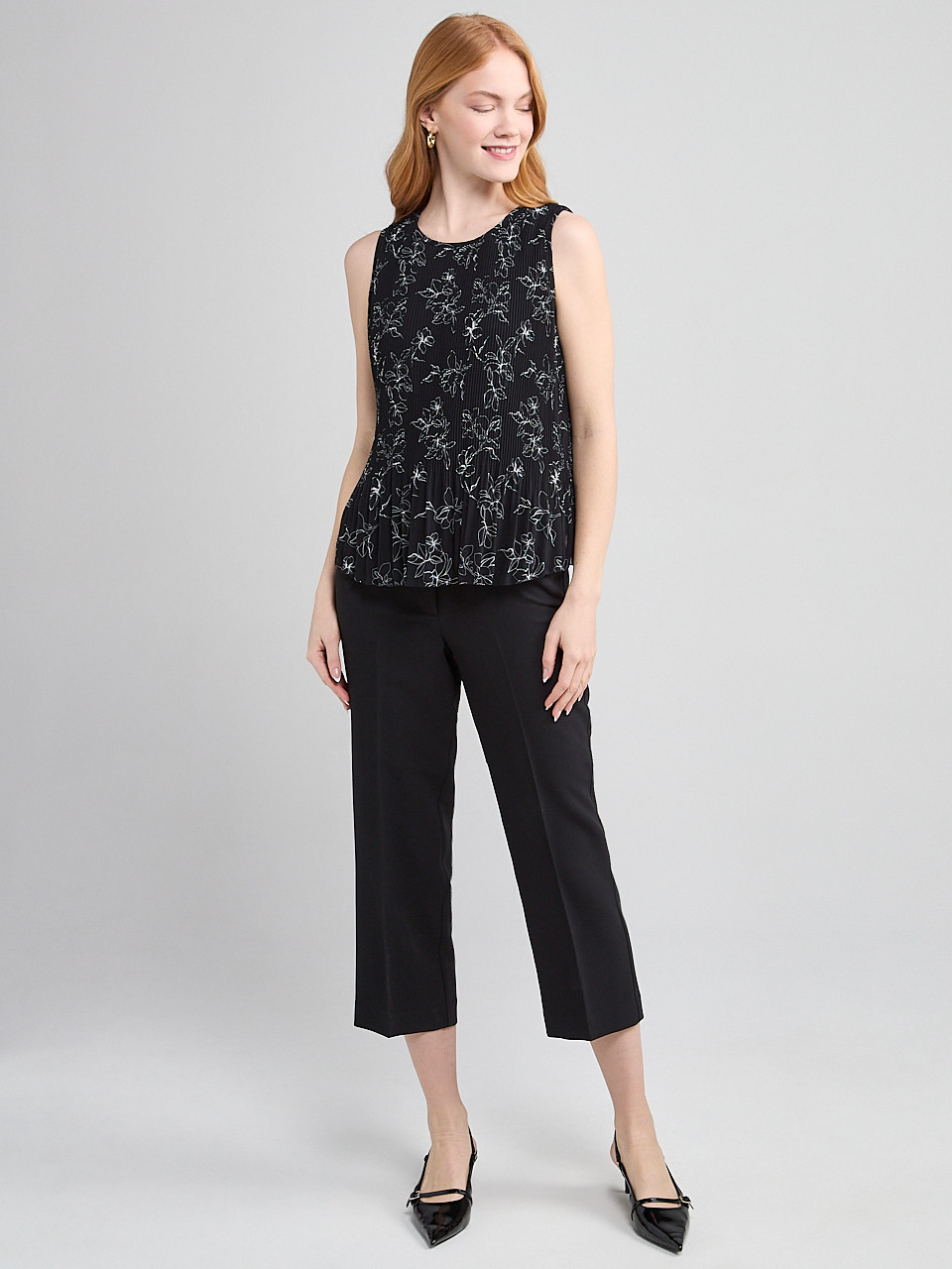 Sleeveless Pleated Top in Line Floral | Ricki's