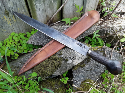 Cuttoe style longknife with hand carved effigy of a face Cuttoe style longknife with hand carved effigy of a face