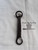 Hand forged bottle opener with file work on handle water mark