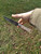 Deer bone handle patch knife with poured pewter bolster showing balance of knife