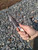 Deer bone handle patch knife with poured pewter bolster knife in hand
